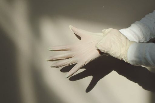 Protective glove used during adhesive removal and wood floor cleaning