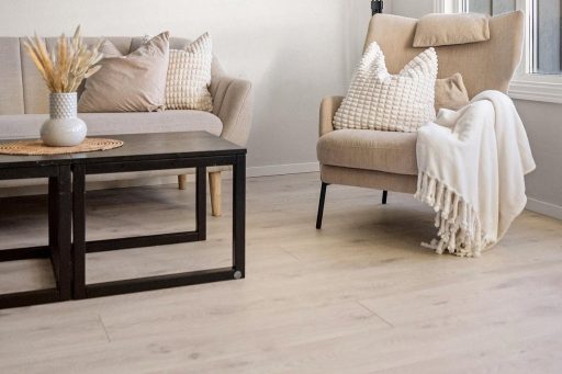 Light wide plank floor in living room showing a softer modern look and a cleaner more open visual feel