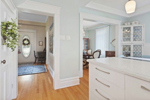 Narrow plank hardwood floor in a traditional home showing a classic pattern and a more detailed board layout