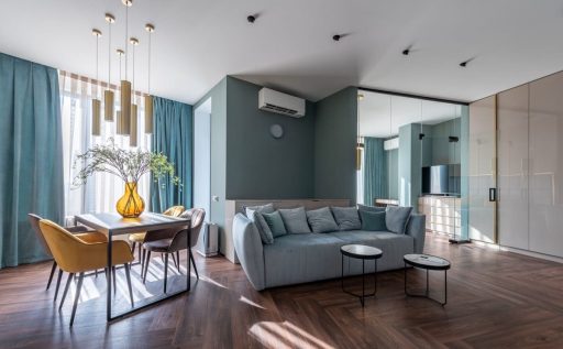 Restored hardwood floor in a modern living room showing the rich finished look after professional floor refinishing