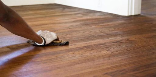 Wiping hardwood floor stain during the staining process