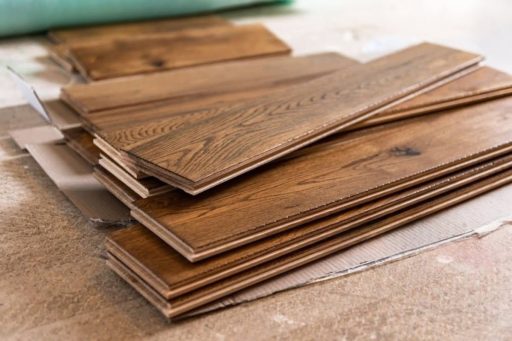 Stack of hardwood floor planks prepared for board replacement repair