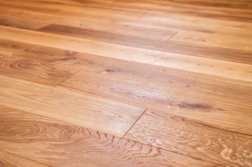 Hardwood floor with natural tone variation and visible wood grain
