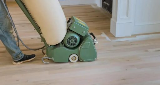 Drum sanding hardwood floor with professional floor sanding machine