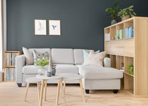 Hardwood floor refinishing contractor in home interior showing the kind of professional result homeowners can expect after restoration