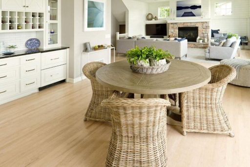 Light hardwood floor in a living room interior with natural tones and furniture