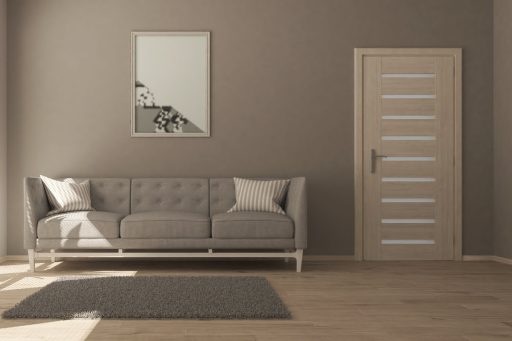 Light wood floor in minimalist living room showing a clean modern surface after moisture-related repair work
