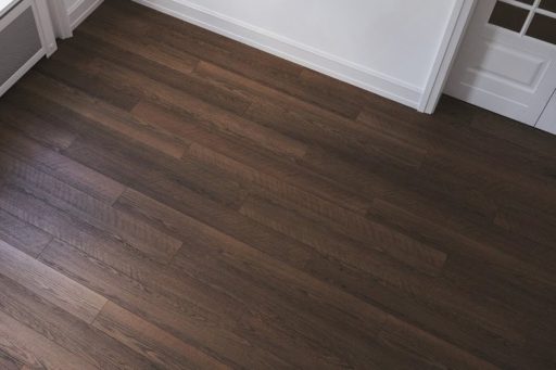 Dark hardwood floor in interior room with smooth finish and visible wood grain